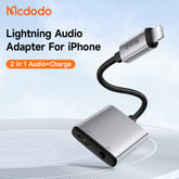 ADAPTADOR DE AUDIO MCDODO 2 EM 1 LIGHTNING PARA LIGHTNING + DC COM REPRODUÇÃO DE MUSICA 3,5 MM